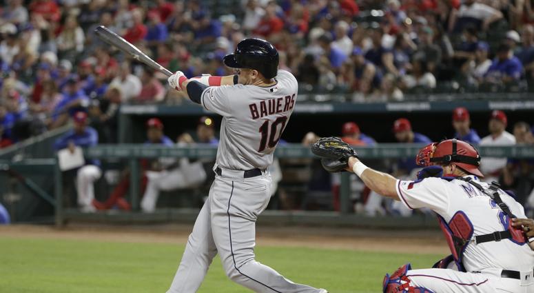 Cleveland Indians left fielder Jake Bauers (10) hits a home run in the seventh inning against the Texas Rangers at Globe Life Park in Arlington. Mandatory Credit: Tim Heitman-USA TODAY Sports MLB: Cleveland Indians at Texas Rangers