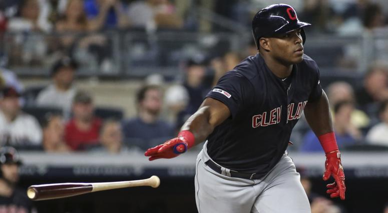 Aug 16, 2019; Bronx, NY, USA; Cleveland Indians right fielder Yasiel Puig (66) watches his solo home run in the seventh inning against the New York Yankees at Yankee Stadium. Cleveland Indians outfielder Yasiel Puig