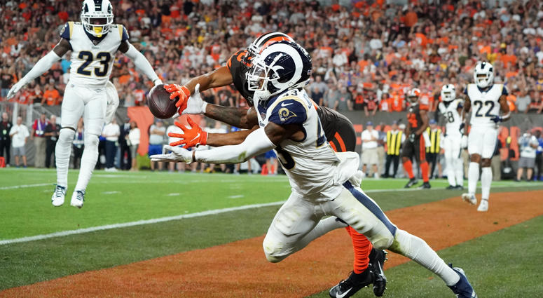 Sep 22, 2019; Cleveland, OH, USA; Los Angeles Rams strong safety John Johnson (43) intercepts a pass intended for Cleveland Browns wide receiver Damion Ratley (18) in the end zone in the fourth quarter at FirstEnergy Stadium. The Rams defeated the Browns