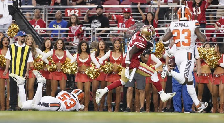 San Francisco 49ers running back Tevin Coleman (26) scores a touchdown against Cleveland Browns middle linebacker Joe Schobert (53) and strong safety Damarious Randall (23) during the second quarter at Levi s Stadium. San Francisco 49ers running back Tevin Coleman (26) scores a touchdown against Cleveland Browns middle linebacker Joe Schobert (53) and strong safety Damarious Randall (23) during the second quarter at Levi s Stadium.