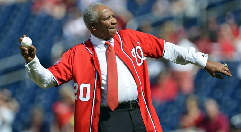 MLB former player and manger Frank Robinson throws out the first pitch before the game between Atlanta Braves and Washington Nationals at Nationals Park. MLB former player and manger Frank Robinson throws out the first pitch before the game between Atlanta Braves and Washington Nationals at Nationals Park.