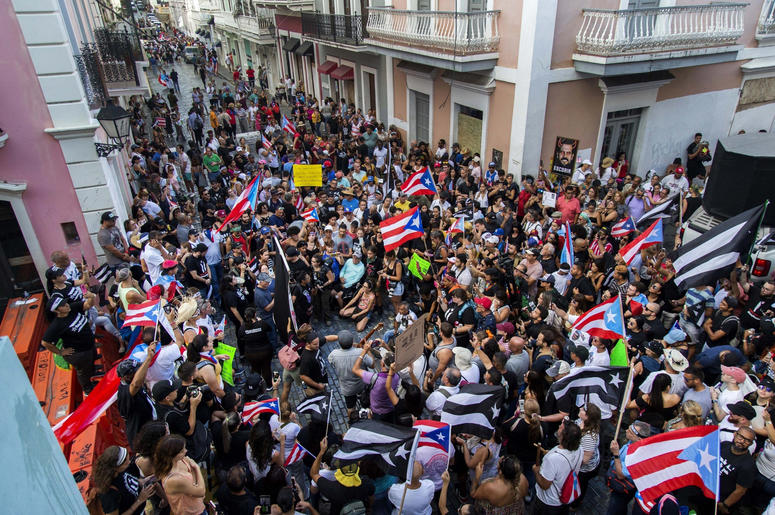 Manifestantes protestan contra el gobernador de Puerto Rico, Ricardo Rosselló, en San Juan, Puerto Rico, el domingo 21 de julio de 2019. Manifestantes protestan contra el gobernador de Puerto Rico, Ricardo Rosselló, en San Juan, Puerto Rico, el domingo 21 de julio de 2019.