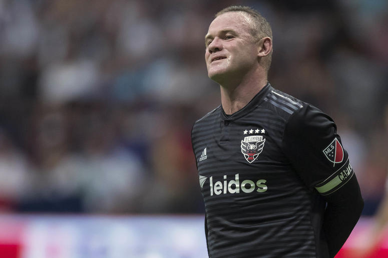 En esta foto del 17 de agosto de 2019, Wayne Rooney, del D.C. United, sonríe depués de hacer un disparo en el partido ante los Whitecaps de Vancouver En esta foto del 17 de agosto de 2019, Wayne Rooney, del D.C. United, sonríe depués de hacer un disparo en el partido ante los Whitecaps de Vancouver