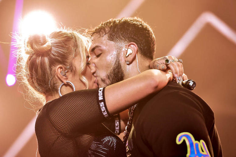 Karol G and Anuel AA kiss live on stage during their concert at United Palace Theater on November 17, 2018 in New York City. Karol G and Anuel AA kiss live on stage during their concert at United Palace Theater on November 17, 2018 in New York City.