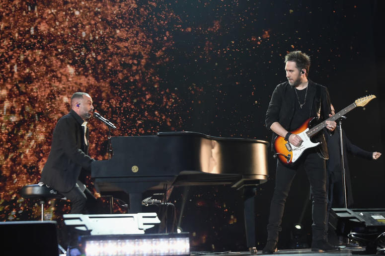 Mario Domm and Pablo Hurtado of 'Camila' perform onstage at One Voice: Somos Live! A Concert For Disaster Relief at Marlins Park on October 14, 2017 in Miami, Florida. Mario Domm and Pablo Hurtado of 'Camila' perform onstage at One Voice: Somos Live! A Concert For Disaster Relief at Marlins Park on October 14, 2017 in Miami, Florida.