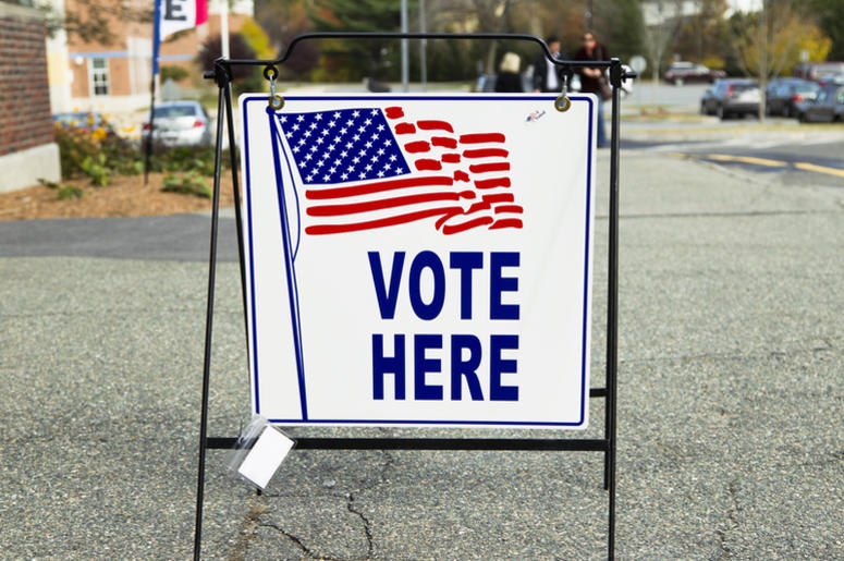 vote here sign at an election polling place