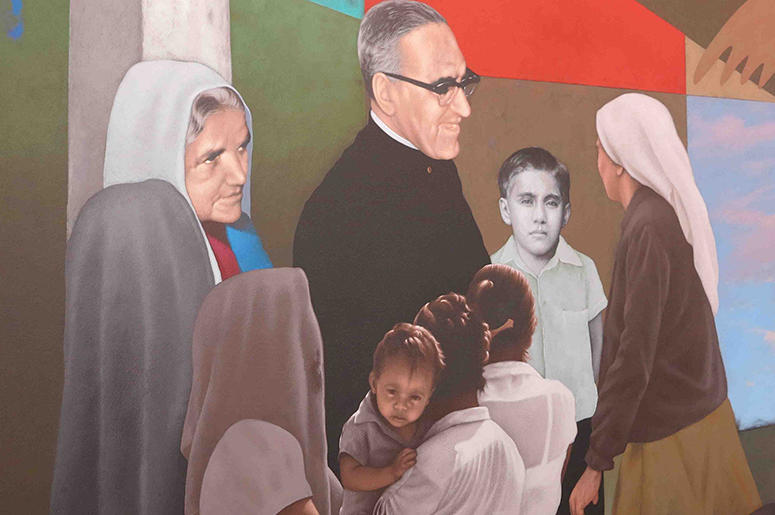Slain Archbishop Oscar Romero is memorialized in a mural, part of which is shown here at the international airport in El Salvador. The Vatican is likely to declare the martyr a Catholic saint. Slain Archbishop Oscar Romero is memorialized in a mural, part of which is shown here at the international airport in El Salvador. The Vatican is likely to declare the martyr a Catholic saint.