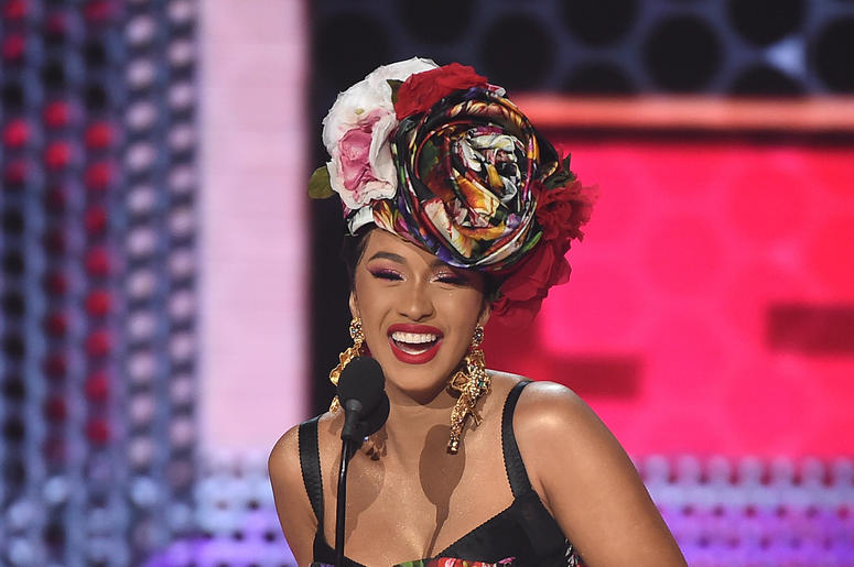 Cardi B onstage at the 2018 American Music Awards at the Microsoft Theatre on October 9, 2018 in Los Angeles, California. Cardi B onstage at the 2018 American Music Awards at the Microsoft Theatre on October 9, 2018 in Los Angeles, California.