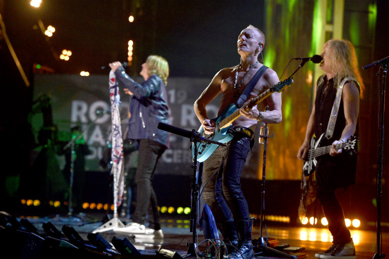 Inductees Joe Elliott, Phil Collen and Rick Savage of Def Leppard perform at the 2019 Rock & Roll Hall Of Fame Induction Ceremony Inductees Joe Elliott, Phil Collen and Rick Savage of Def Leppard perform at the 2019 Rock & Roll Hall Of Fame Induction Ceremony