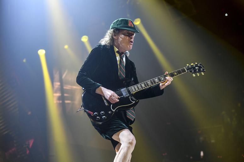 Angus Young performs Angus Young performs