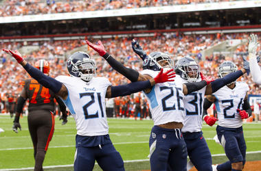 Sep 8, 2019; Cleveland, OH, USA; Tennessee Titans cornerback Logan Ryan (26) celebrates his interception with cornerback Malcolm Butler (21) and Tennessee Titans free safety Kevin Byard (31) against the Cleveland Browns during the fourth quarter at FirstE
