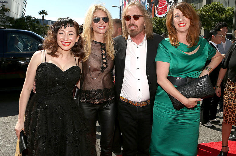 The one in the green is suing the hot blonde