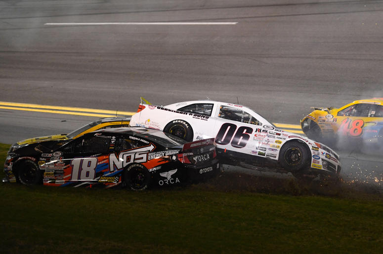 ARCA Series drivers Chuck Hiers (06) and Riley Herbst (18) and Brad Smith (48) wreck during the Lucas Oil 200 at Daytona International Speedway. ARCA Series drivers Chuck Hiers (06) and Riley Herbst (18) and Brad Smith (48) wreck during the Lucas Oil 200 at Daytona International Speedway.