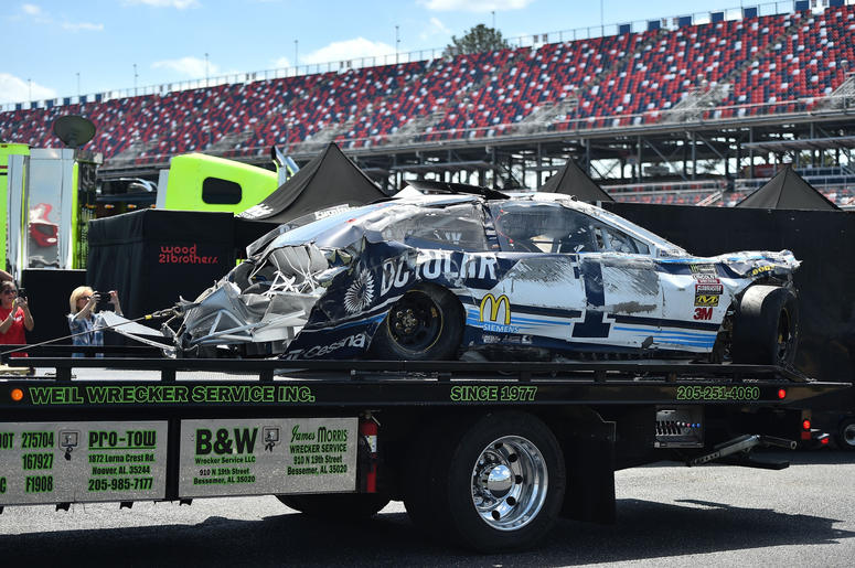 he wrecked car of NASCAR Cup Series driver Jamie Mcmurray (1) is brought to the garage during practice for the GIECO 500 at Talladega Superspeedway. he wrecked car of NASCAR Cup Series driver Jamie Mcmurray (1) is brought to the garage during practice for the GIECO 500 at Talladega Superspeedway.