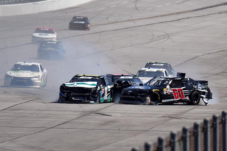 NASCAR Xfinity Series drivers Ryan Truex (11) and Ty Majeski (60) wreck in front of the field during the Sparks Energy 300 at Talladega Superspeedway. NASCAR Xfinity Series drivers Ryan Truex (11) and Ty Majeski (60) wreck in front of the field during the Sparks Energy 300 at Talladega Superspeedway.
