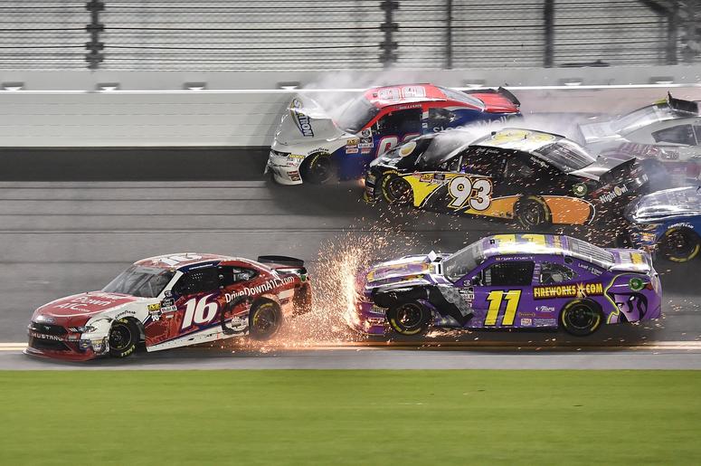 ASCAR Xfinity Series driver Ryan Reed (16) slides in front of Ryan Truex (11) as Josh Williams (90) and Jeff Green (93) wreck during the Coca-Cola Firecracker 250 at Daytona International Speedway. ASCAR Xfinity Series driver Ryan Reed (16) slides in front of Ryan Truex (11) as Josh Williams (90) and Jeff Green (93) wreck during the Coca-Cola Firecracker 250 at Daytona International Speedway.