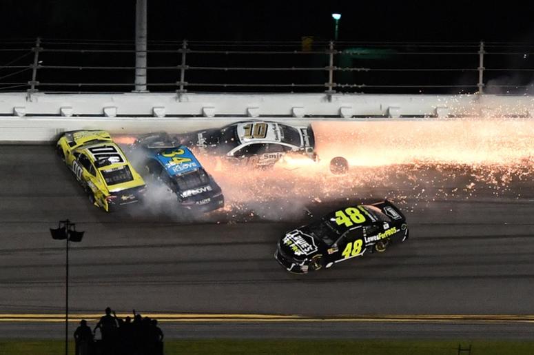 NASCAR Cup Series driver Joey Gase (00), Michael McDowell (34) and Aric Almirola (10) wreck in front of Jimmie Johnson (48) during the Coke Zero Sugar 400 at Daytona International Speedway. NASCAR Cup Series driver Joey Gase (00), Michael McDowell (34) and Aric Almirola (10) wreck in front of Jimmie Johnson (48) during the Coke Zero Sugar 400 at Daytona International Speedway.