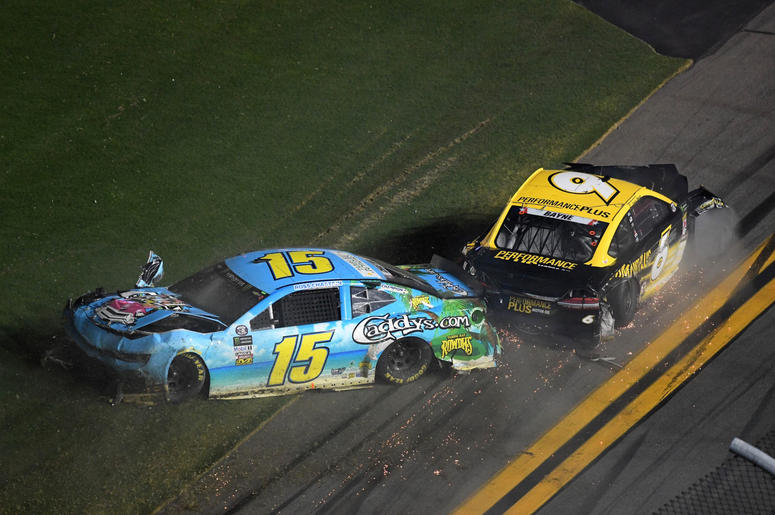 Jul 7, 2018; Daytona Beach, FL, USA; NASCAR Cup Series driver Ross Chastain (15) and NASCAR Cup Series driver Trevor Bayne (6) wreck during the Coke Zero Sugar 400 at Daytona International Speedway. Jul 7, 2018; Daytona Beach, FL, USA; NASCAR Cup Series driver Ross Chastain (15) and NASCAR Cup Series driver Trevor Bayne (6) wreck during the Coke Zero Sugar 400 at Daytona International Speedway.