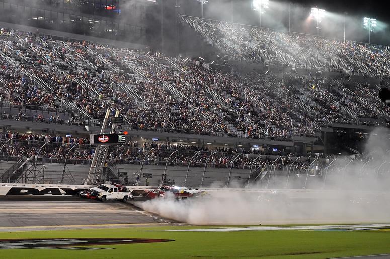 An emergency blows away speedy dry to absorb oil and water left on the track after a wreck during the Coke Zero Sugar 400 at Daytona International Speedway. An emergency blows away speedy dry to absorb oil and water left on the track after a wreck during the Coke Zero Sugar 400 at Daytona International Speedway.