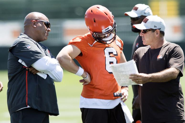 Cleveland Browns quarterbacks coach Ken Zampese, right, talks with quarterback Baker Mayfield (6) and head coach Hue Jackson during training camp at the Cleveland Browns Training Complex Cleveland Browns quarterbacks coach Ken Zampese, right, talks with quarterback Baker Mayfield (6) and head coach Hue Jackson during training camp at the Cleveland Browns Training Complex