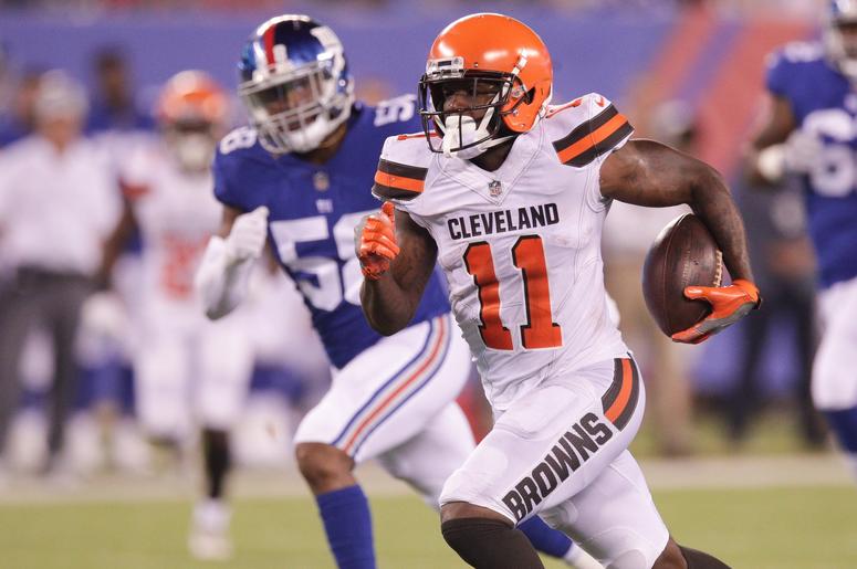 Cleveland Browns wide receiver Antonio Callaway (11) runs for a touchdown after a catch against New York Giants linebacker Tae Davis (58) during the second half at MetLife Stadium. Cleveland Browns wide receiver Antonio Callaway (11) runs for a touchdown after a catch against New York Giants linebacker Tae Davis (58) during the second half at MetLife Stadium.