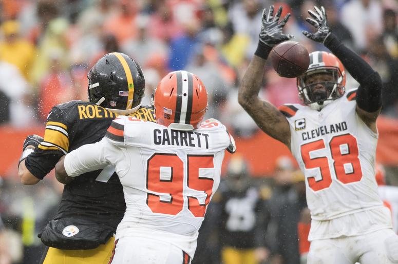 Cleveland Browns defensive end Myles Garrett (95) forces a fumble from Pittsburgh Steelers quarterback Ben Roethlisberger (7) as linebacker Christian Kirksey (58) goes for the ball during the second half at FirstEnergy Stadium. Cleveland Browns defensive end Myles Garrett (95) forces a fumble from Pittsburgh Steelers quarterback Ben Roethlisberger (7) as linebacker Christian Kirksey (58) goes for the ball during the second half at FirstEnergy Stadium.