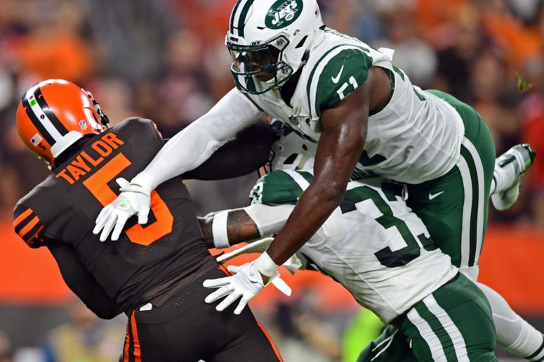 New York Jets linebacker Brandon Copeland (51) andNew York Jets defensive back Jamal Adams (33) hits Cleveland Browns quarterback Tyrod Taylor (5) during the first half of a game at FirstEnergy Stadium. New York Jets linebacker Brandon Copeland (51) andNew York Jets defensive back Jamal Adams (33) hits Cleveland Browns quarterback Tyrod Taylor (5) during the first half of a game at FirstEnergy Stadium.