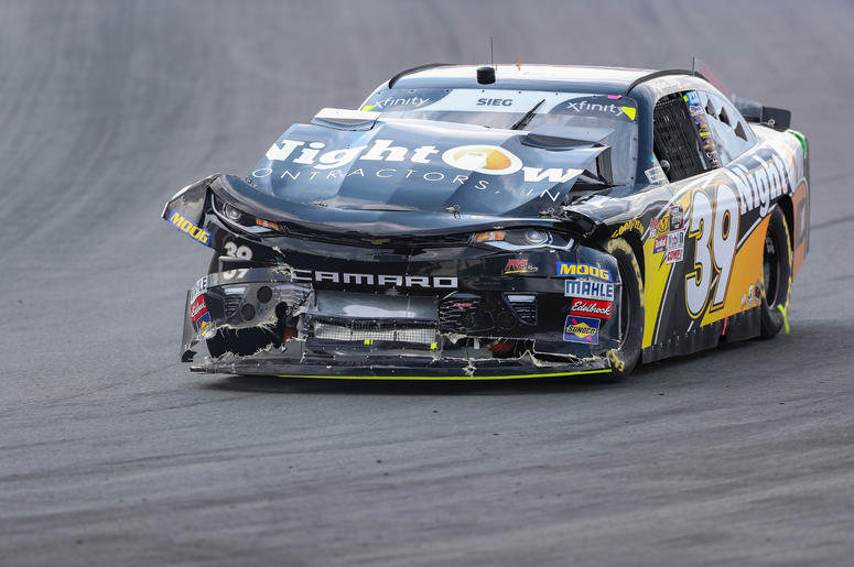NASCAR Xfinity Series driver Ryan Sieg (39) tries to return to the pits after a wreck during the Drive for the Cure 200 at Charlotte Motor Speedway. NASCAR Xfinity Series driver Ryan Sieg (39) tries to return to the pits after a wreck during the Drive for the Cure 200 at Charlotte Motor Speedway.