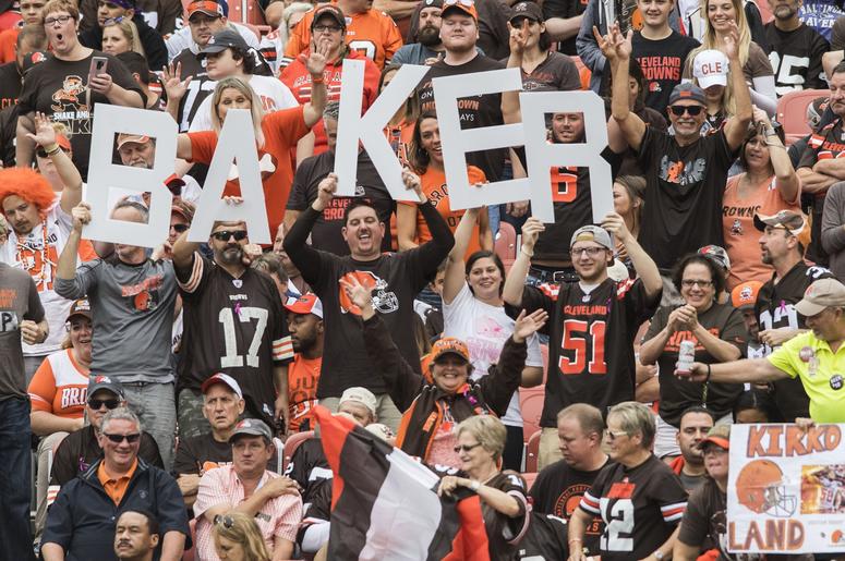 Fans hold a sign for Cleveland Browns quarterback Baker Mayfield (6) during the game between the Cleveland Browns and the Baltimore Ravens at FirstEnergy Stadium. Fans hold a sign for Cleveland Browns quarterback Baker Mayfield (6) during the game between the Cleveland Browns and the Baltimore Ravens at FirstEnergy Stadium.
