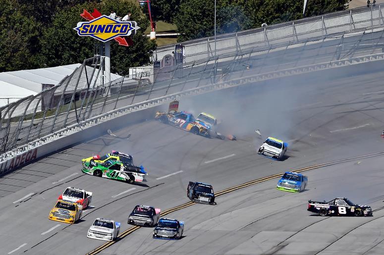 ASCAR Camping World Truck Series driver John Hunter Nemechek (8), NASCAR Camping World Truck Series driver Ben Rhodes (41), NASCAR Camping World Truck Series driver Bo LeMastus (54) wreck during the Talladega 250 at Talladega Superspeedway. ASCAR Camping World Truck Series driver John Hunter Nemechek (8), NASCAR Camping World Truck Series driver Ben Rhodes (41), NASCAR Camping World Truck Series driver Bo LeMastus (54) wreck during the Talladega 250 at Talladega Superspeedway.