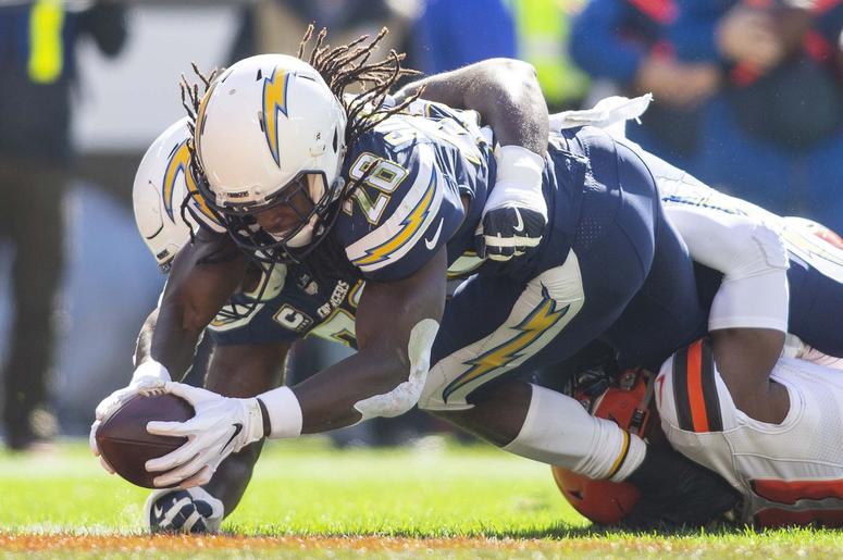 Los Angeles Chargers running back Melvin Gordon (28) dives into the end zone for a touchdown against the Cleveland Browns during the first quarter at FirstEnergy Stadium. Los Angeles Chargers running back Melvin Gordon (28) dives into the end zone for a touchdown against the Cleveland Browns during the first quarter at FirstEnergy Stadium.