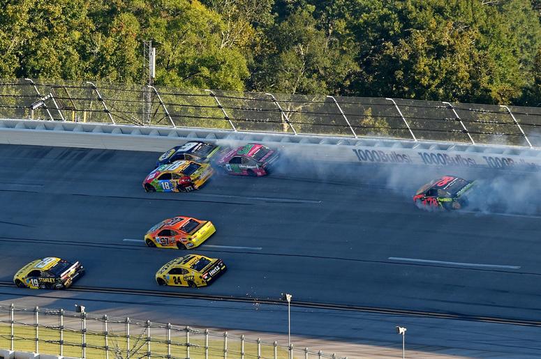 NASCAR Cup Series driver Kyle Busch (18) and NASCAR Cup Series driver Chase Elliott (9) wreck during the 1000Bulbs.com at Talladega Superspeedway. NASCAR Cup Series driver Kyle Busch (18) and NASCAR Cup Series driver Chase Elliott (9) wreck during the 1000Bulbs.com at Talladega Superspeedway.