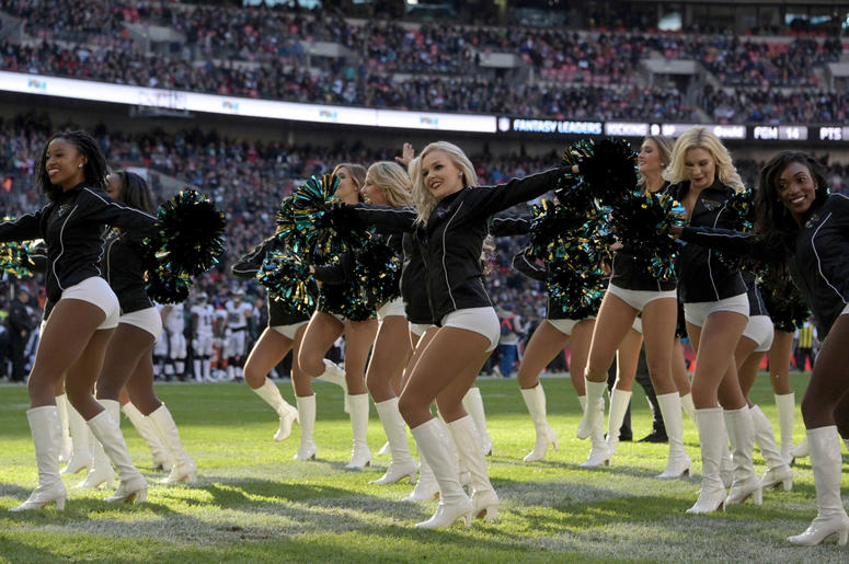 hiladelphia Eagles cheerleaders perform during an NFL International Series game against the Jacksonville Jaguars at Wembley Stadium. hiladelphia Eagles cheerleaders perform during an NFL International Series game against the Jacksonville Jaguars at Wembley Stadium.