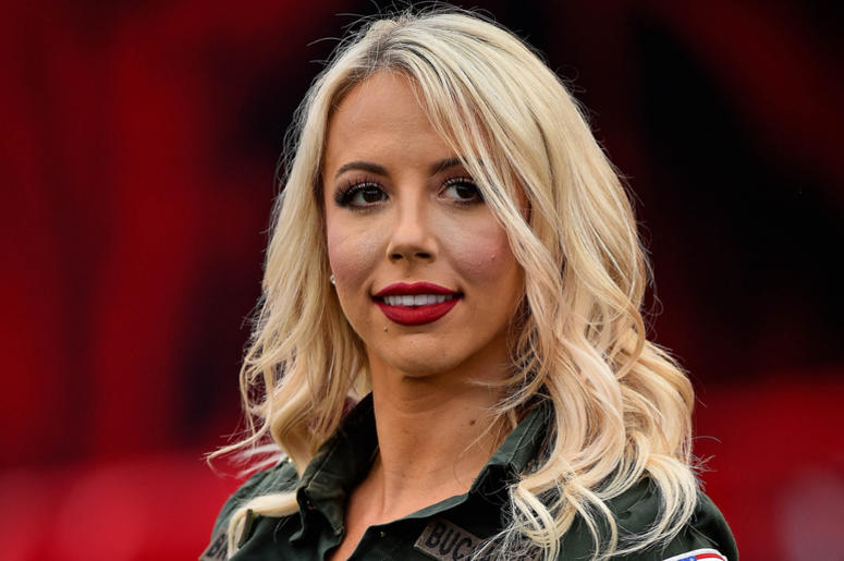 A Tampa Bay Buccaneers cheerleader looks on during the second half against the Washington Redskins at Raymond James Stadium. A Tampa Bay Buccaneers cheerleader looks on during the second half against the Washington Redskins at Raymond James Stadium.