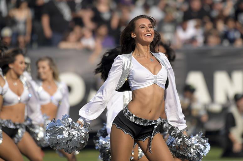 Oakland Raiders raiderette cheerleaders dance during the game against the Los Angeles Chargers at Oakland Coliseum. Oakland Raiders raiderette cheerleaders dance during the game against the Los Angeles Chargers at Oakland Coliseum.