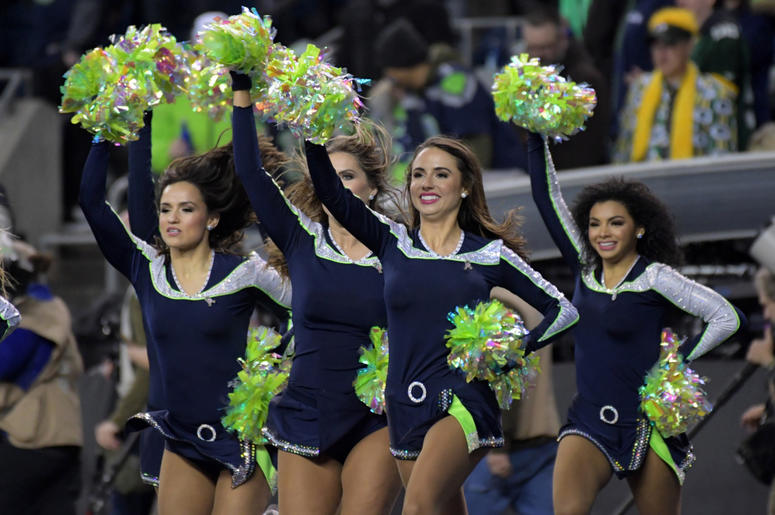 Seattle Seahawks sea gals cheerleaders perform during the game against the Green Bay Packers at CenturyLink Field Seattle Seahawks sea gals cheerleaders perform during the game against the Green Bay Packers at CenturyLink Field