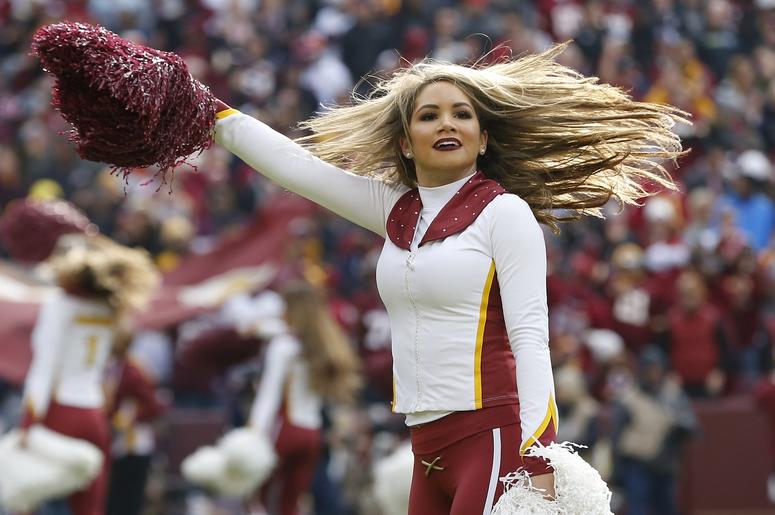A Washington Redskins cheerleader dances on the field during a timeout against the Houston Texans in the first quarter at FedEx Field A Washington Redskins cheerleader dances on the field during a timeout against the Houston Texans in the first quarter at FedEx Field