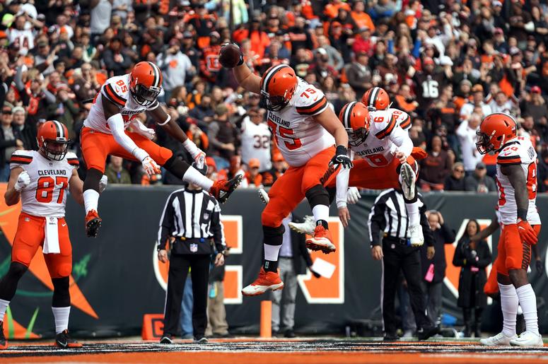 Browns offensive guard Joel Bitonio (75) spikes the ball to celebrate the touchdown by tight end David Njoku (85) against the Cincinnati Bengals. Browns offensive guard Joel Bitonio (75) spikes the ball to celebrate the touchdown by tight end David Njoku (85) against the Cincinnati Bengals.