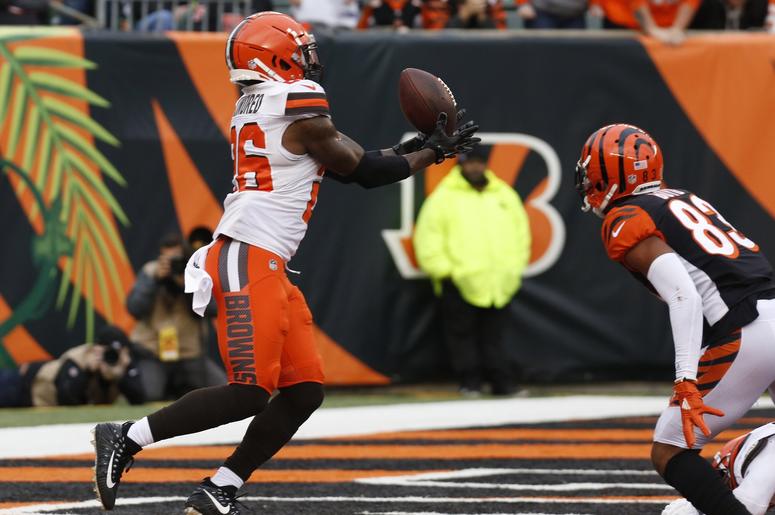 leveland Browns cornerback Derrick Kindred (26) makes a catch in front of Cincinnati Bengals wide receiver Tyler Boyd (83) during the second half at Paul Brown Stadium. leveland Browns cornerback Derrick Kindred (26) makes a catch in front of Cincinnati Bengals wide receiver Tyler Boyd (83) during the second half at Paul Brown Stadium.