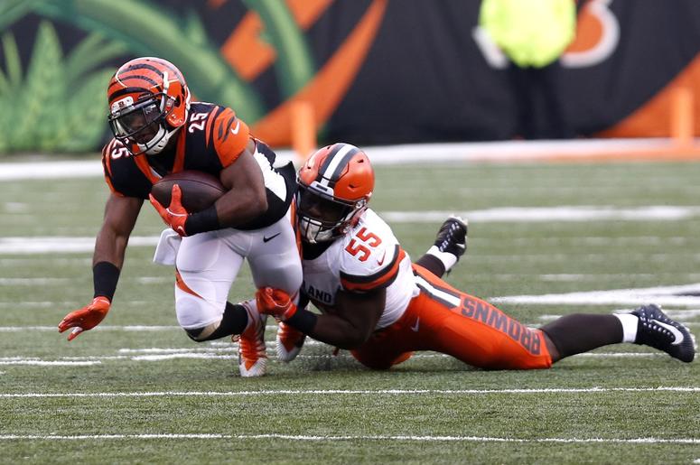 Cincinnati Bengals running back Giovani Bernard (25) is tackled by Cleveland Browns outside linebacker Genard Avery (55) during the second half at Paul Brown Stadium. Cincinnati Bengals running back Giovani Bernard (25) is tackled by Cleveland Browns outside linebacker Genard Avery (55) during the second half at Paul Brown Stadium.