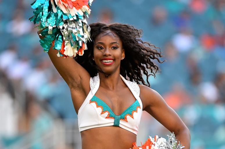 A Miami Dolphins cheerleader performs during the second half between the Miami Dolphins and the Buffalo Bills at Hard Rock Stadium. A Miami Dolphins cheerleader performs during the second half between the Miami Dolphins and the Buffalo Bills at Hard Rock Stadium.