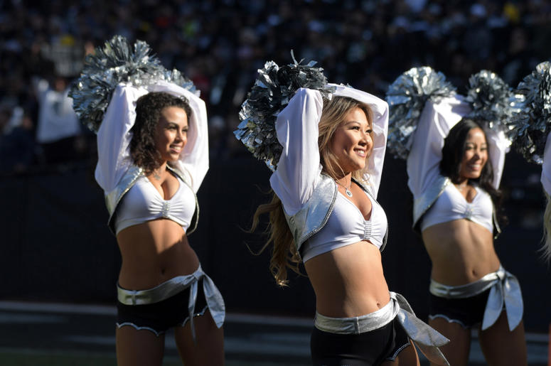Oakland Raiders raiderette cheerleaders dance during the game against the Kansas City Chiefs at Oakland-Alameda County Coliseum. Oakland Raiders raiderette cheerleaders dance during the game against the Kansas City Chiefs at Oakland-Alameda County Coliseum.
