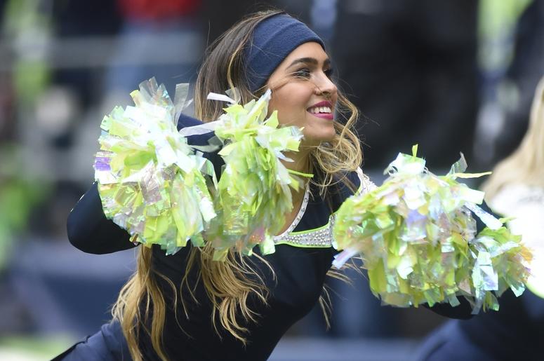 Seattle Seahawks cheerleader performs during a football game against San Francisco 49ers in the first half at CenturyLink Field. Seattle Seahawks cheerleader performs during a football game against San Francisco 49ers in the first half at CenturyLink Field.