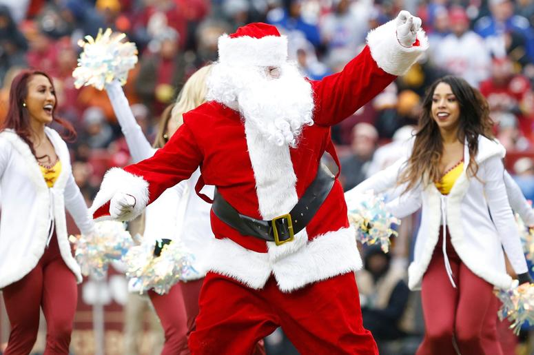 Dec 9, 2018; Landover, MD, USA; Santa Claus dances with Washington Redskins cheerleaders on the field during a timeout against the New York Giants in the second quarter at FedEx Field. The Giants won 40-16. Mandatory Credit: Geoff Burke-USA TODAY Sports Dec 9, 2018; Landover, MD, USA; Santa Claus dances with Washington Redskins cheerleaders on the field during a timeout against the New York Giants in the second quarter at FedEx Field. The Giants won 40-16. Mandatory Credit: Geoff Burke-USA TODAY Sports