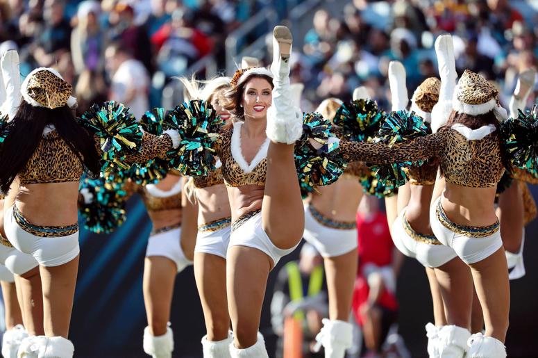 Jacksonville Jaguars cheerleaders cheer against the Washington Redskins during the second half at TIAA Bank Field. Jacksonville Jaguars cheerleaders cheer against the Washington Redskins during the second half at TIAA Bank Field.