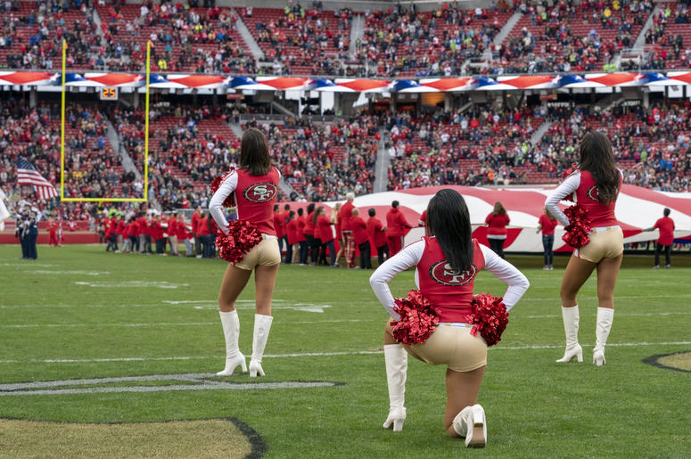 San Francisco 49ers cheerleader Kayla Morris kneels during the national anthem before the game against the Seattle Seahawks at Levi's Stadium. San Francisco 49ers cheerleader Kayla Morris kneels during the national anthem before the game against the Seattle Seahawks at Levi's Stadium.