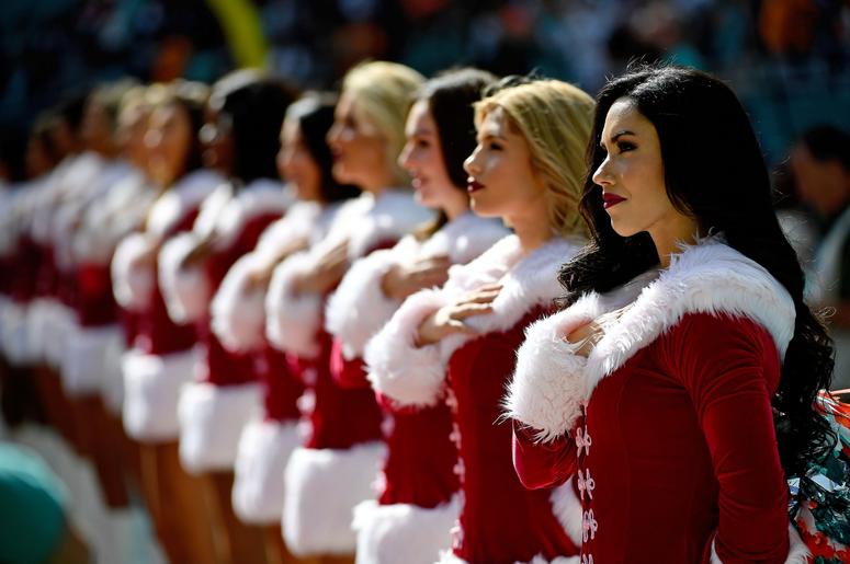 Miami Dolphins cheerleaders stand for the national anthem prior to the game between the Miami Dolphins and the Jacksonville Jaguars at Hard Rock Stadium. Miami Dolphins cheerleaders stand for the national anthem prior to the game between the Miami Dolphins and the Jacksonville Jaguars at Hard Rock Stadium.