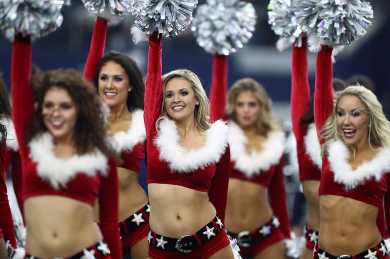 Dallas Cowboys cheerleaders perform in holiday outfits during the halftime show for the game against the Tampa Bay Buccaneers at AT&T Stadium. Dallas Cowboys cheerleaders perform in holiday outfits during the halftime show for the game against the Tampa Bay Buccaneers at AT&T Stadium.