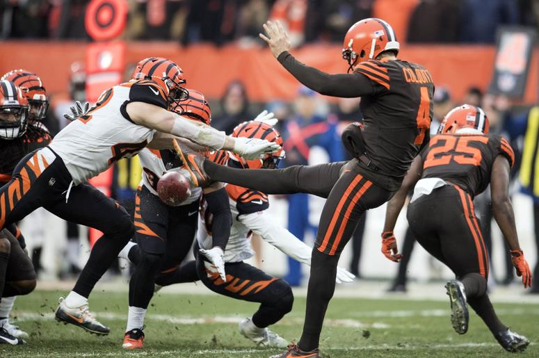 Cincinnati Bengals defensive back Clayton Fejedelem (42) blocks the punt of Cleveland Browns punter Britton Colquitt (4) during the second half at FirstEnergy Stadium. Cincinnati Bengals defensive back Clayton Fejedelem (42) blocks the punt of Cleveland Browns punter Britton Colquitt (4) during the second half at FirstEnergy Stadium.