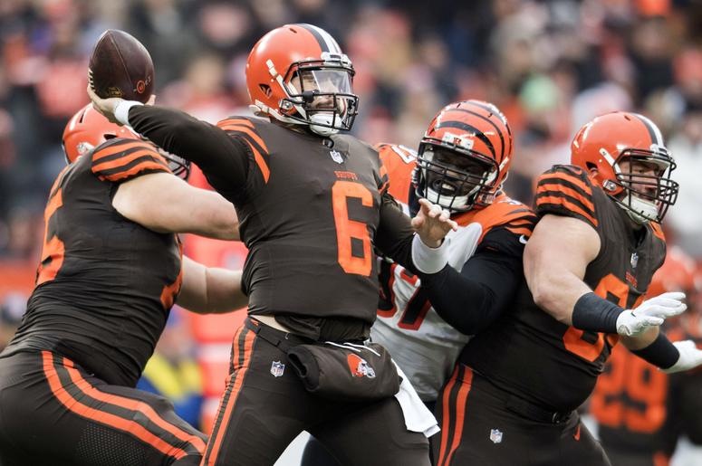 Cleveland Browns quarterback Baker Mayfield (6) throws a pass as Cincinnati Bengals defensive tackle Geno Atkins (97) rushes during the second half at FirstEnergy Stadium. Cleveland Browns quarterback Baker Mayfield (6) throws a pass as Cincinnati Bengals defensive tackle Geno Atkins (97) rushes during the second half at FirstEnergy Stadium.